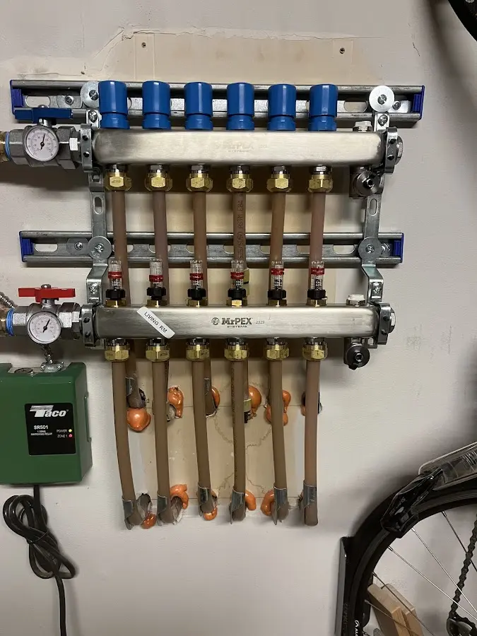 Plumber performing Gas Line Installation at a residential property in Dansville